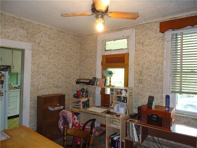 Dining room with door to side porch.