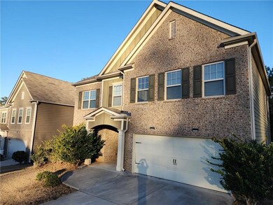 View of front of home featuring a garage