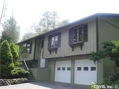 Exterior Front This lovely home boasts an attached