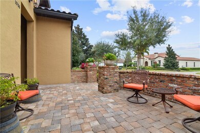 The front terrace is accented with Chicago brick a