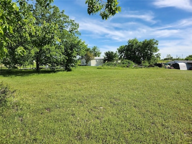 View of yard with a shed