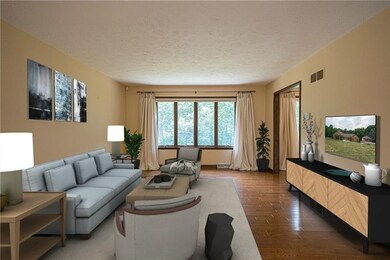 The living room (virtually staged) is a great spac
