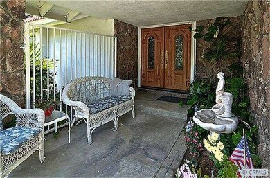 Covered Entrance with Decorator Front Doors & Phan