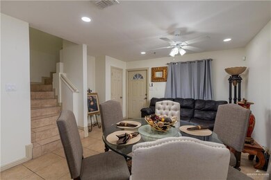 Tiled dining area with ceiling fan