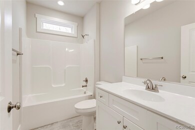 Example of Hall Bath w/Tub-Shower, Vanity, Brushed