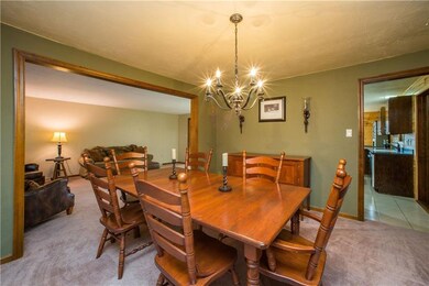 Dining room flows to kitchen. Want to open it up..