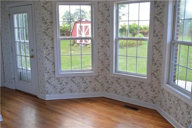 Eating area just off the kitchen with access to the patio.