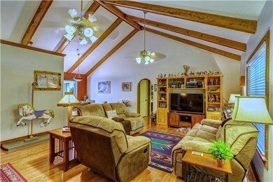 View of the living room check out the exposed beam
