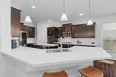 This kitchen truly feels like the heart of the home — perfect for gathering, cooking, and making memories around the island.