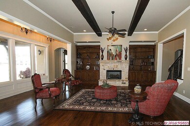 Oak built-in bookshelves adorn each side of the st