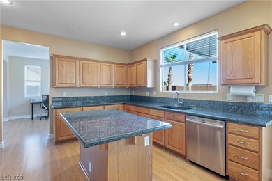 The warm-toned hardwood floors and soft, natural l