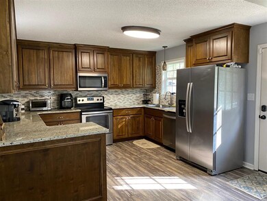 Spacious kitchen with lots of cabinets.  Stainless