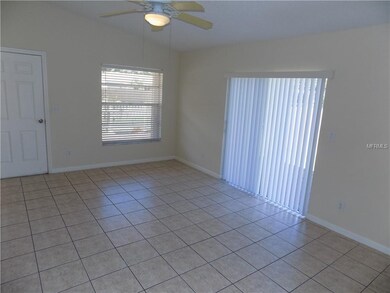 GREAT ROOM WITH SLIDER LEADING TO POOL
