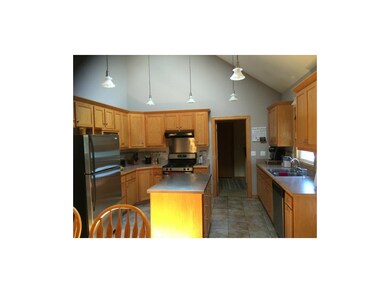 Beautiful kitchen with stainless steel top on isla