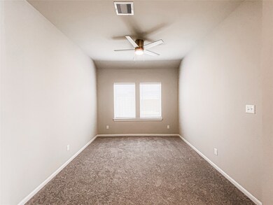 Home office/study with high energy efficient ceiling fan