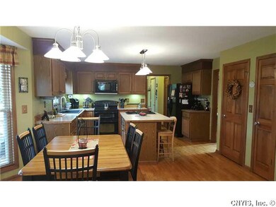 Kitchen. This home offers a spacious eat-in kitche
