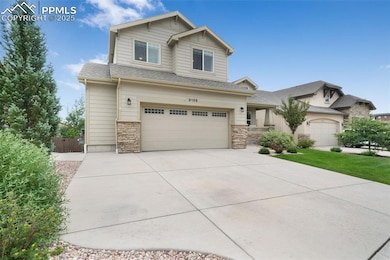 Front of home, landscaped, large driveway for extra parking