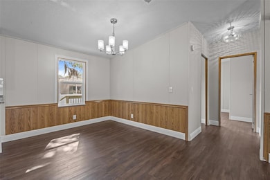 Dining Room - Hallway takes you to the secondary bedooms, second bath, and laundry