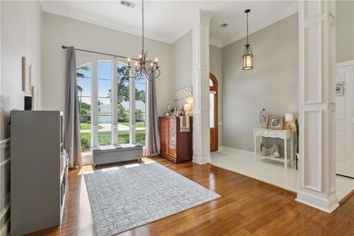 Gorgeous foyer and dining area with large picture