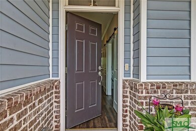 Attractive brick trim accent on front of home