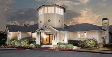 View of front facade featuring a chimney, french d