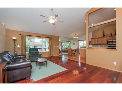 Great room with view toward kitchen and sun room