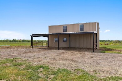 View of pole building featuring a rural view and 