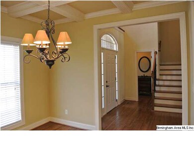 DINING ROOM LOOKING TOWARD FOYER