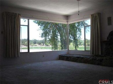 Picture windows of main house with massive view of