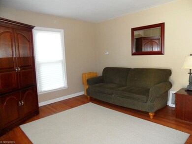Living room with fresh paint and beautiful hardwoo