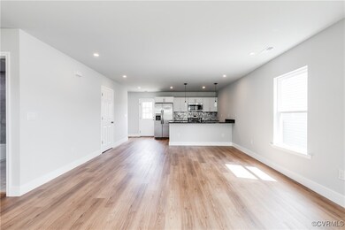 Unfurnished living room with recessed lighting and