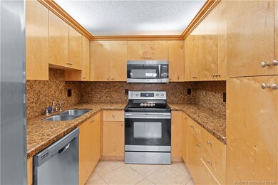 1935 SW Silver Pine Way unit 117D1, Palm City, FL 34990 - photo 6
