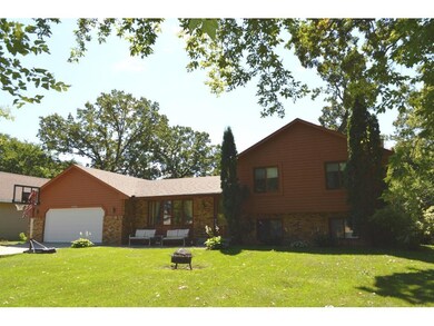 Attractive four- level home on a large lot that  s