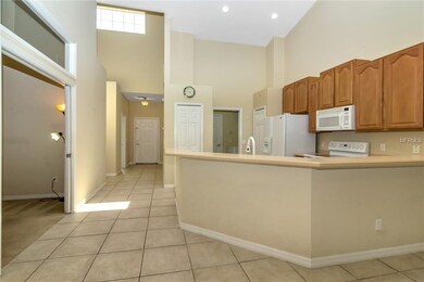Foyer, kitchen, laundry room, bonus room view