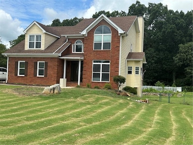 View of front of house with a front lawn