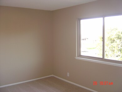 Fresh paint and carpet in bedroom 1