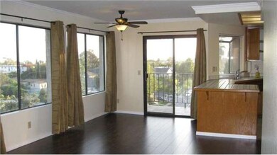 Dining room leads to balcony. Great view of downto