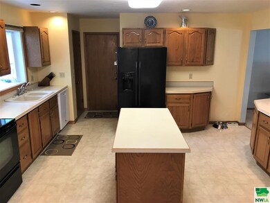 Oak cabinets throughout.  The island is movable. K