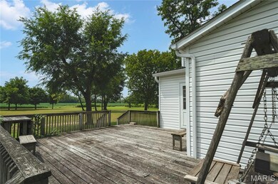 Wooden terrace with a lawn