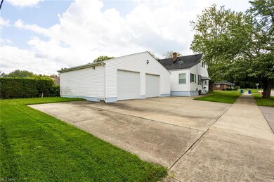 Garage with a lawn