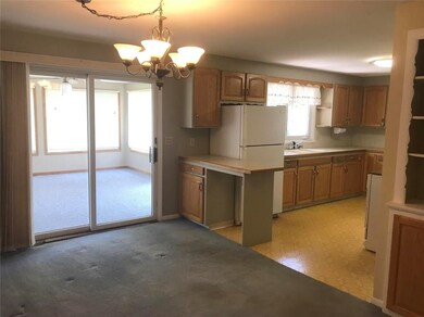 Dining room with slider to sun room
