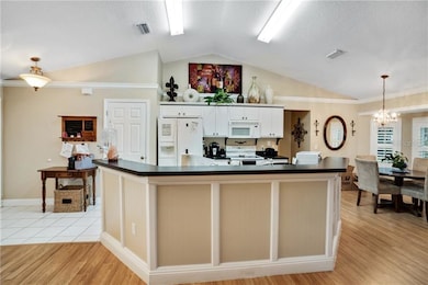 Open kitchen with closet pantry, decorative kick p