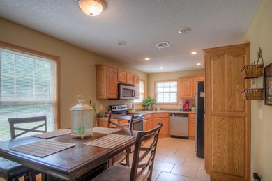 Dining opens to Kitchen