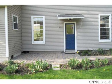 Exterior Back Back entrance-notice the pavers (pat