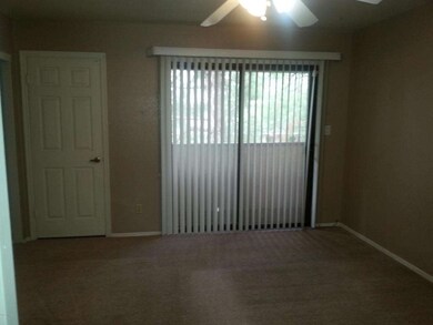 upstairs bedroom with balcony