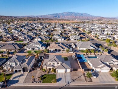 View of property location with a mountainous background and nearby suburban area