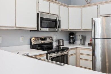 Kitchen featuring stainless steel appliances and w