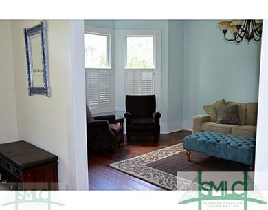 Living Room with bay windows and plenty of room fo