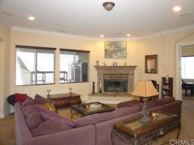 Beautiful living room with great fireplace and rec
