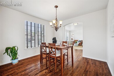 Spacious dining area with real wood flooring!